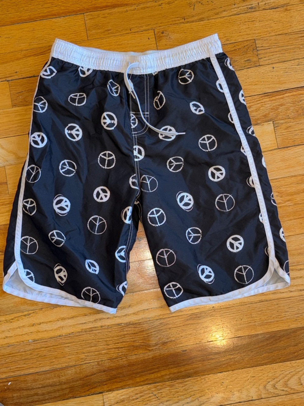 Black Kids Swim Trunks with White Peace Sign Print